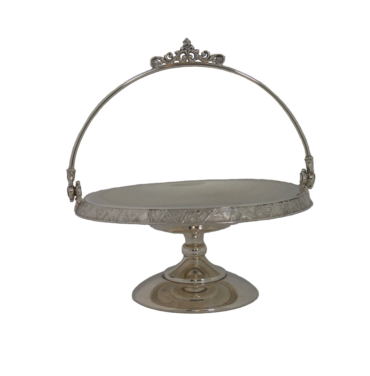 Vintage silver-plated candy dish early 1900's with handle and on pastel.