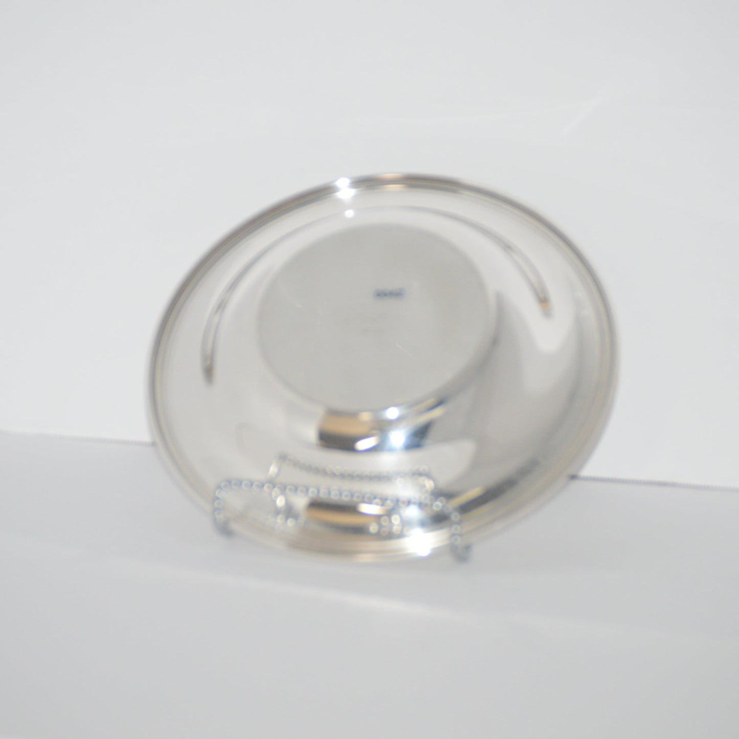 Vintage round silver plated serving bowl with rope top by W. M. Rogers #862 measures 10 1/2" wide x 2 1/2" deep