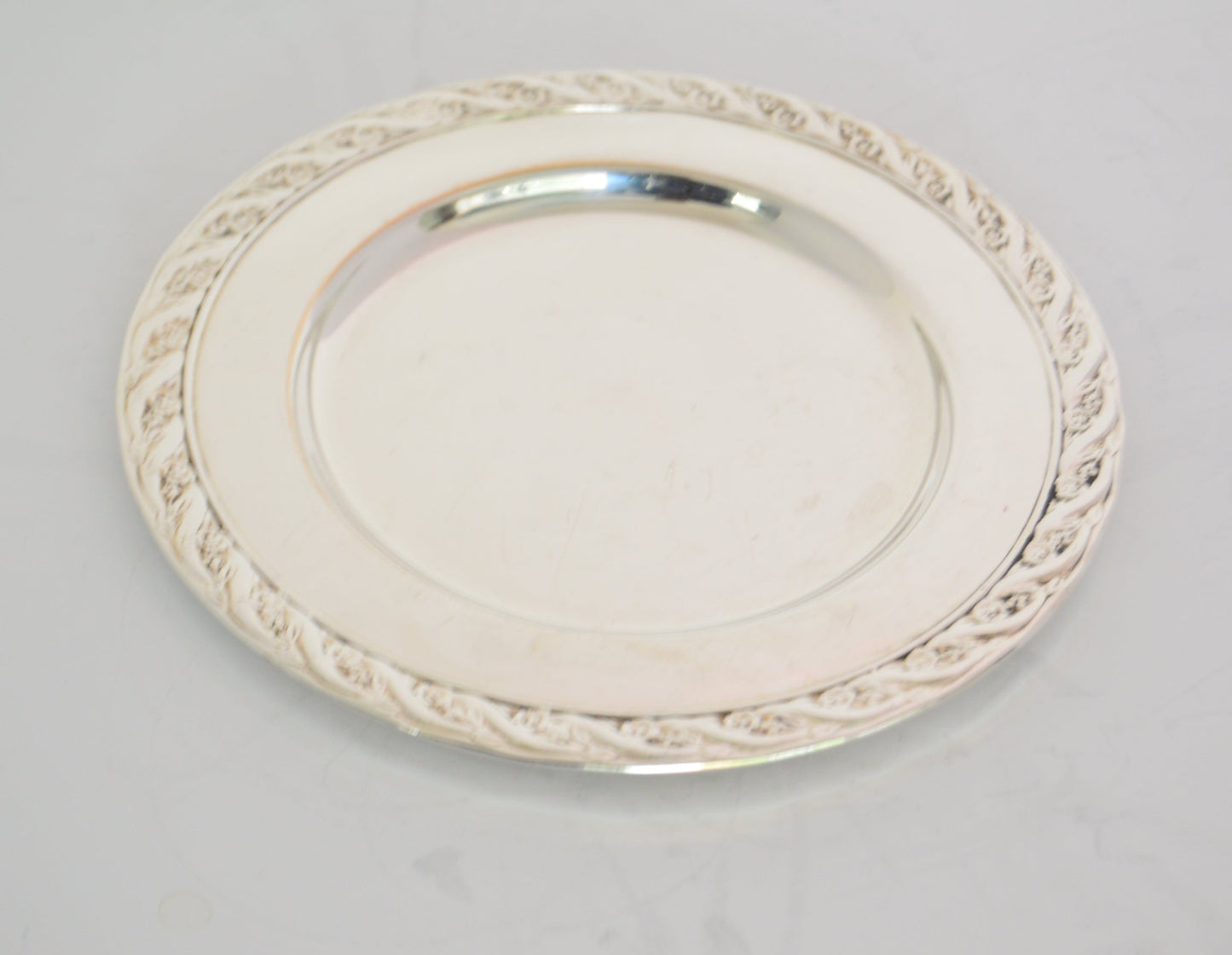 Vintage silver-plate 6 1/2" wide (unmarked) pre-owned very good condition.