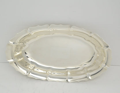 Vintage Bread or serving dish 12"long X 6 1/2" wide X 1 1/2" deep by Lunt silver-plated (pre-owned) very good condition.